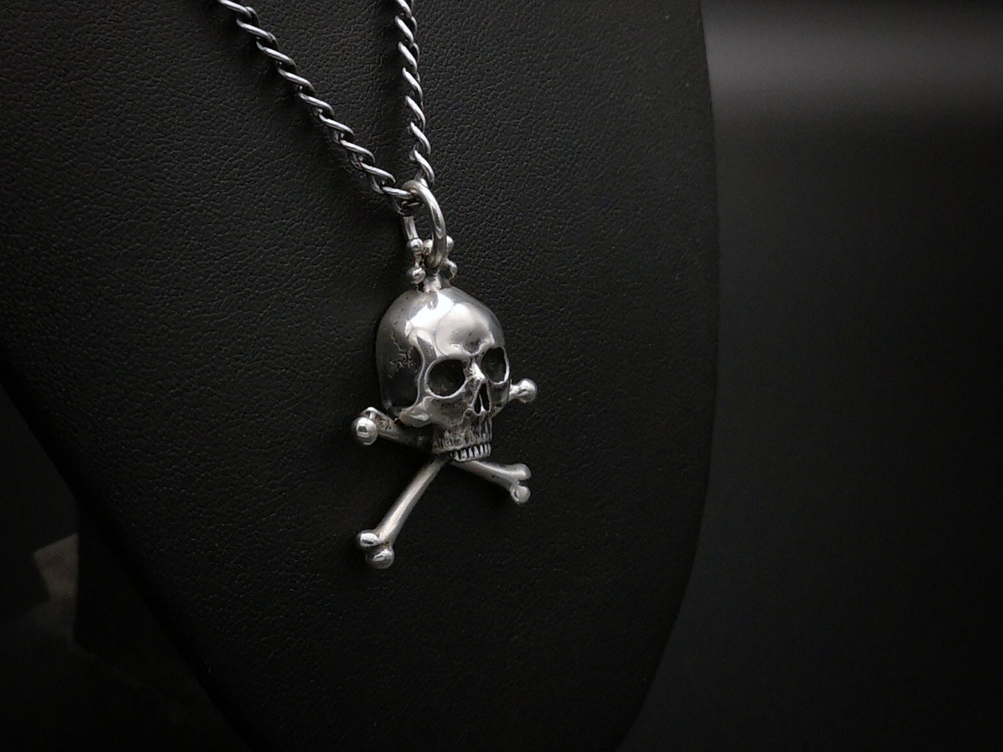 Sterling silver skull and crossbones pendant necklace with heavy curb chain