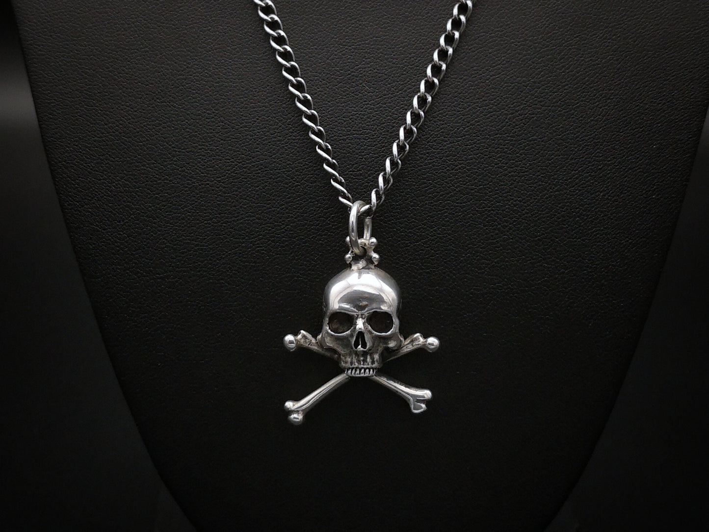 Sterling silver skull and crossbones pendant necklace with heavy curb chain