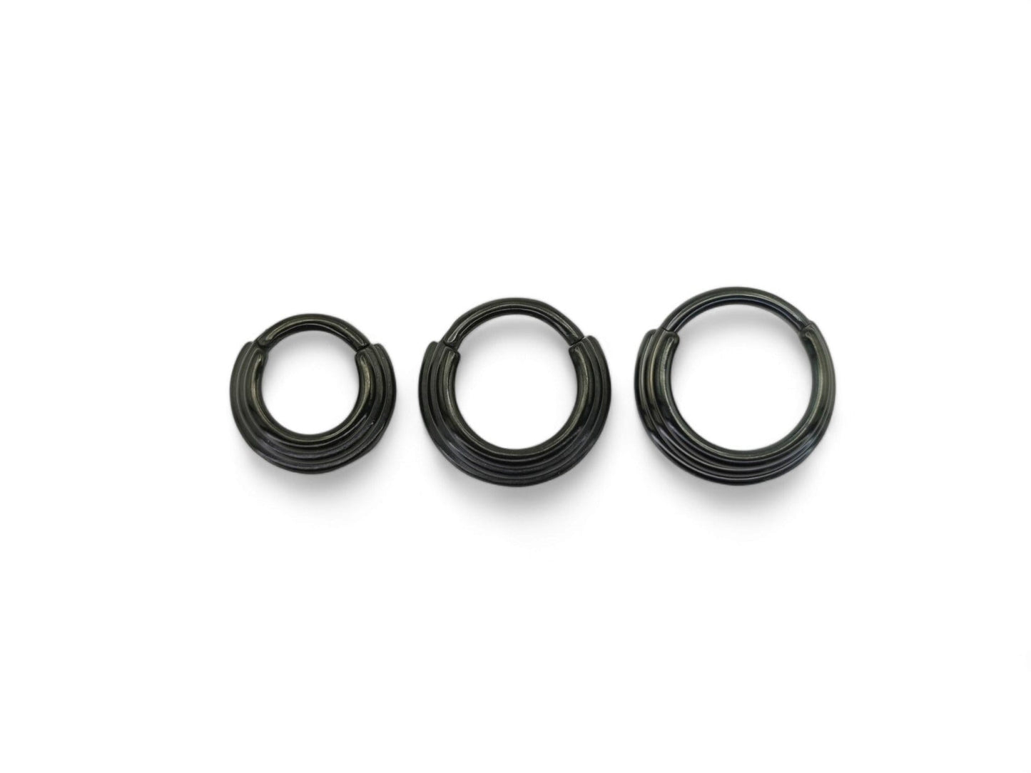 Black surgical steel Illusion clicker ring, 1.2mm/16g, 6mm-10mm diameter